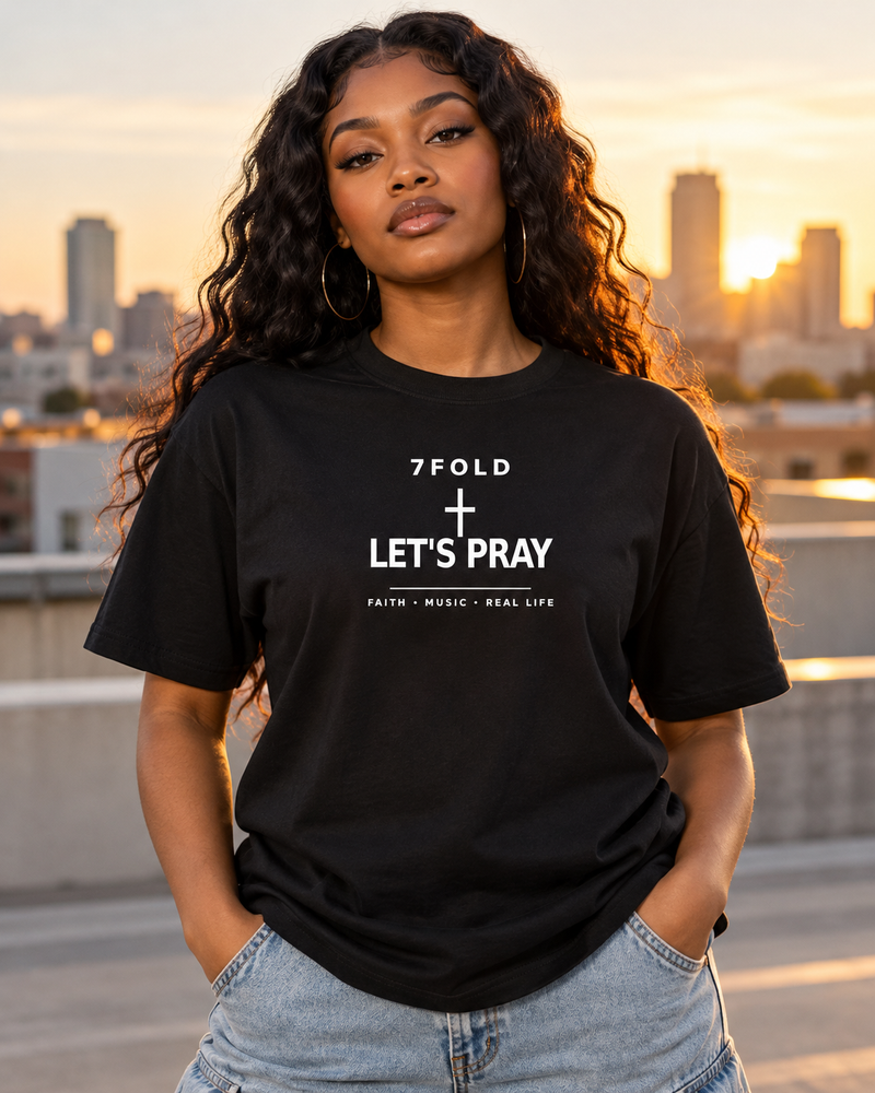 7Fold Need Prayer? tee worn by a Black model